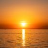 Sunset on the Aegean sea coast in Greece